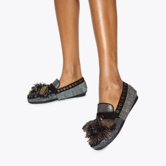 Mocasines con pompones