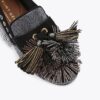 Mocasines con pompones
