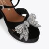 Sandalias con plataforma y lazo Sandalias con plataforma y lazo