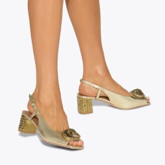 Zapatos Chelsea con tacón y talón abierto