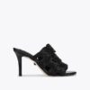 Zapatos destalonados con cadena de cristales